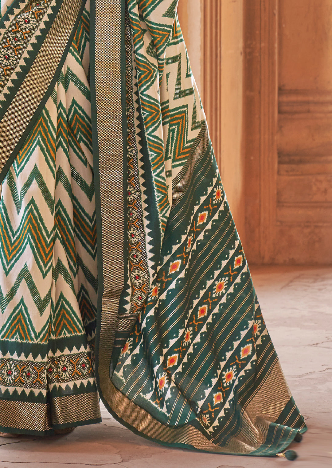 White & Green Woven Patola Silk Saree