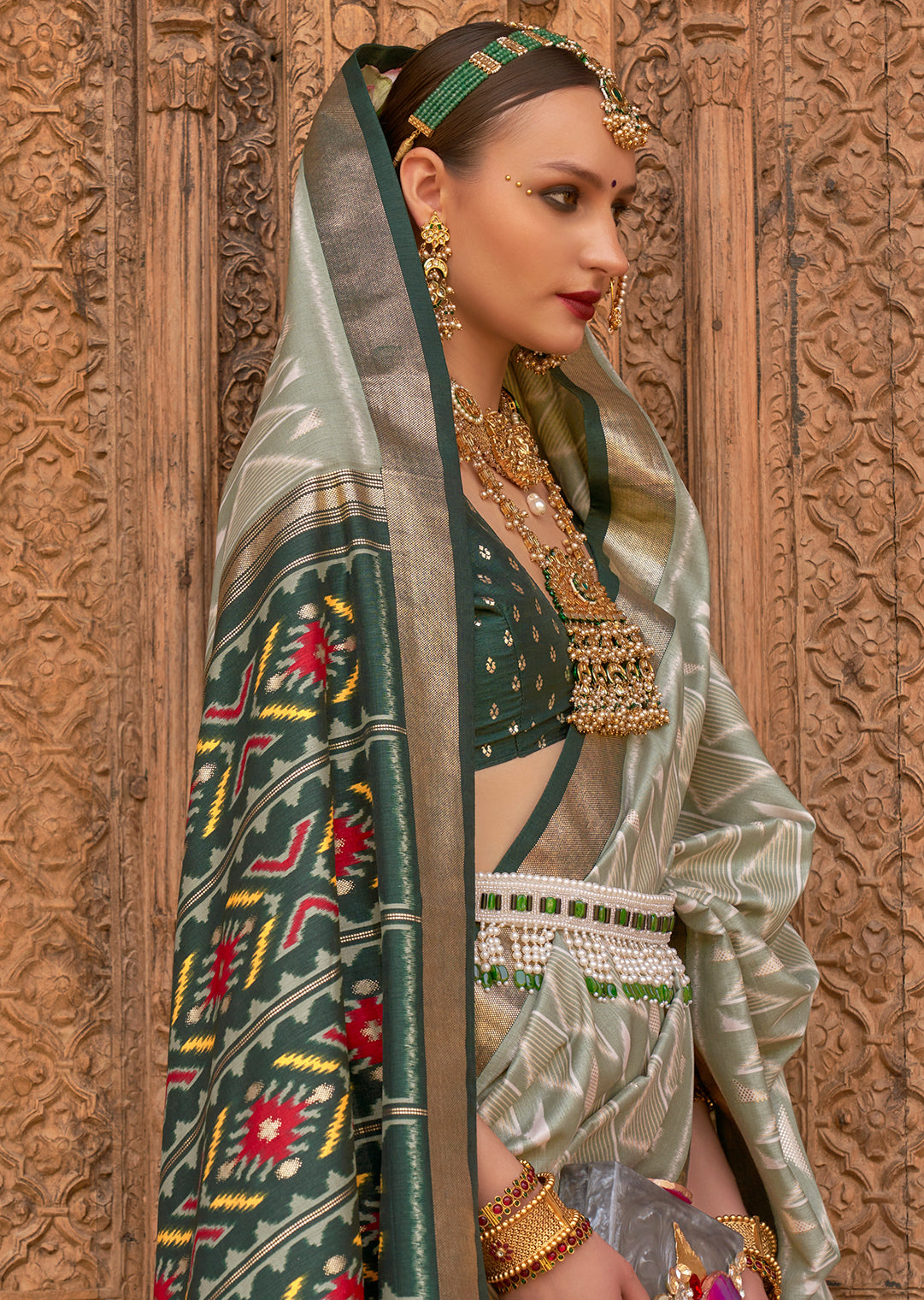 Tea Green Woven Patola Silk Saree