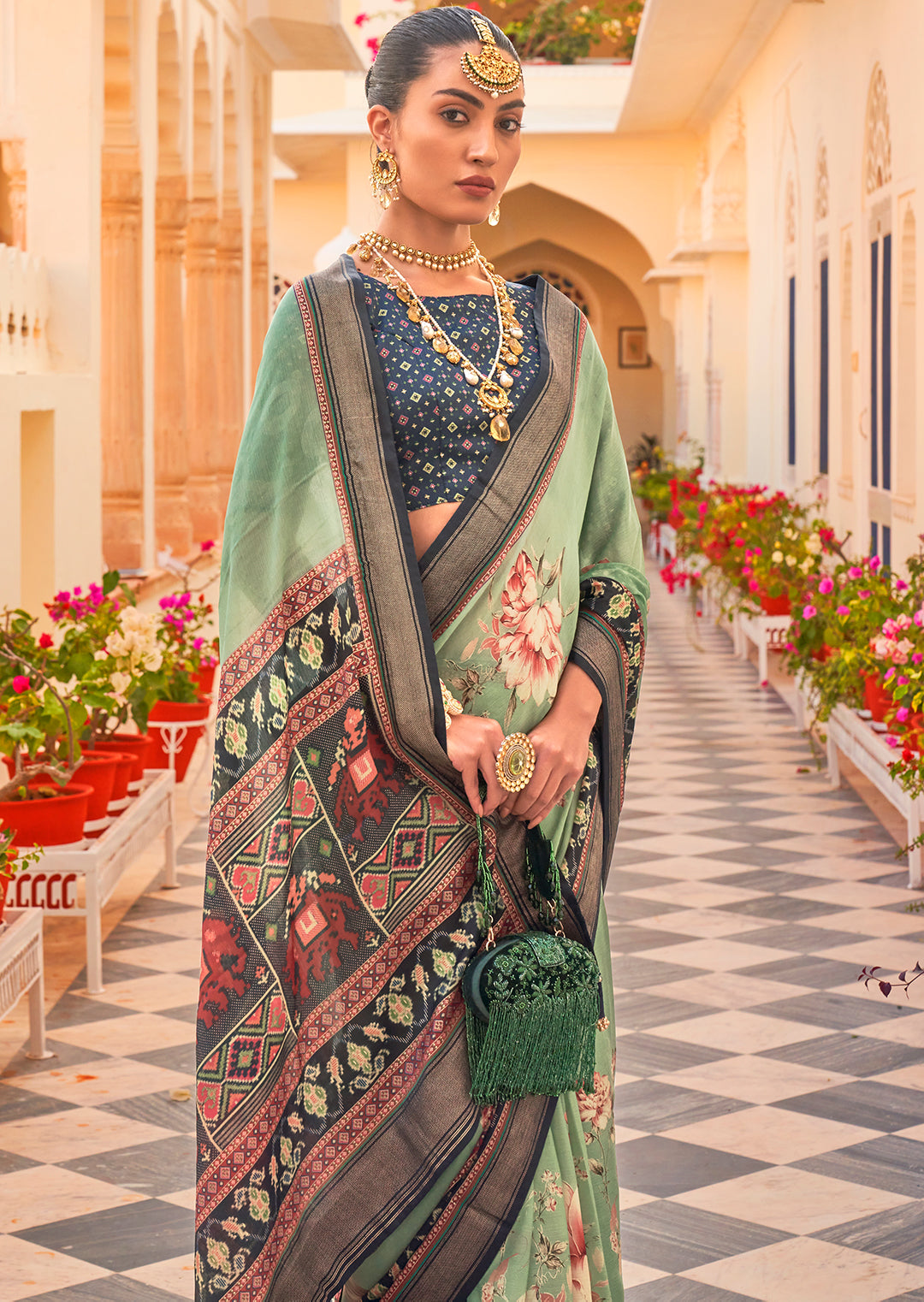 Pistachio Green Woven Chiffon Patola Saree