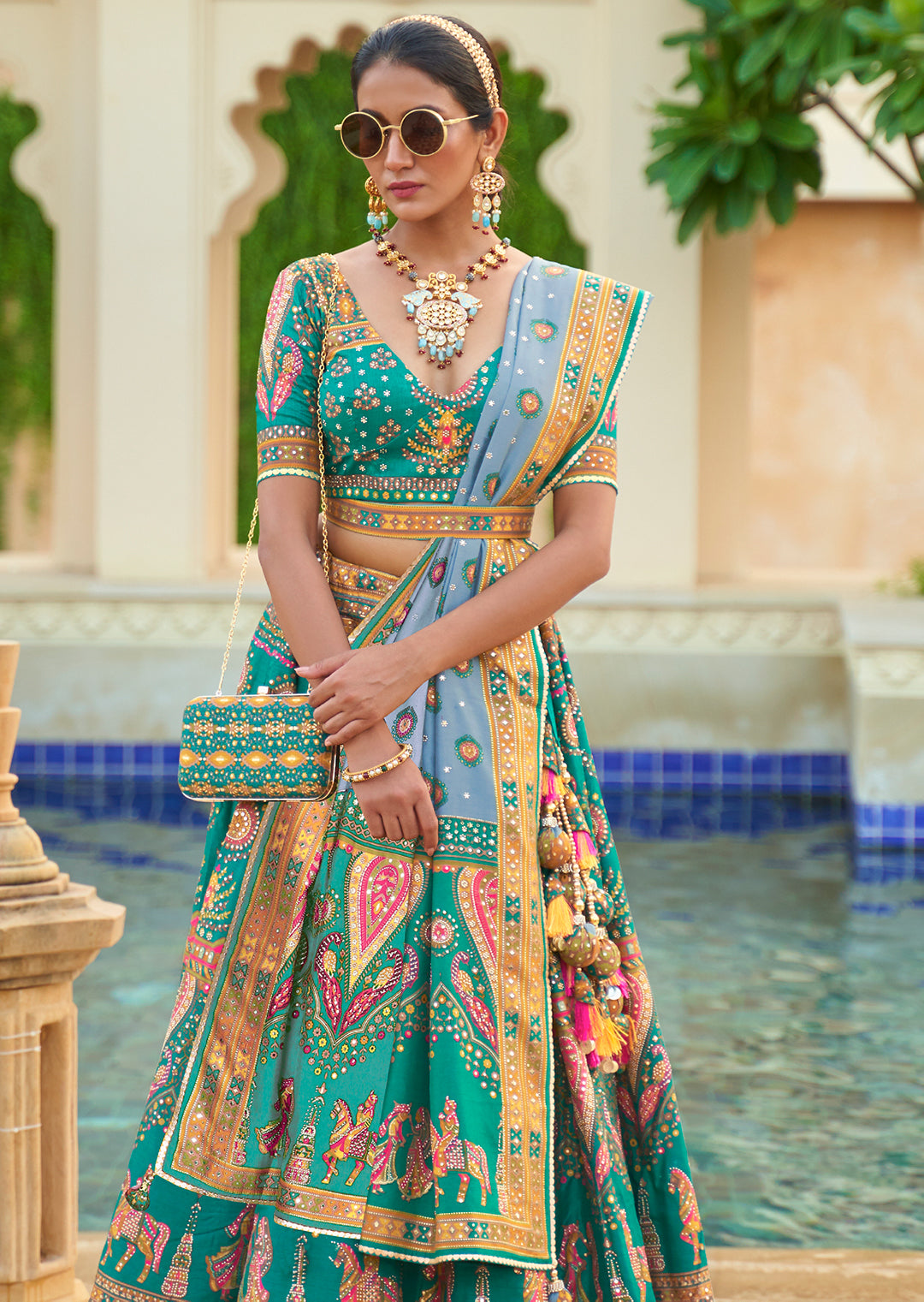 Turquoise Green Woven Traditional Rajwadi Patola Silk Lehenga