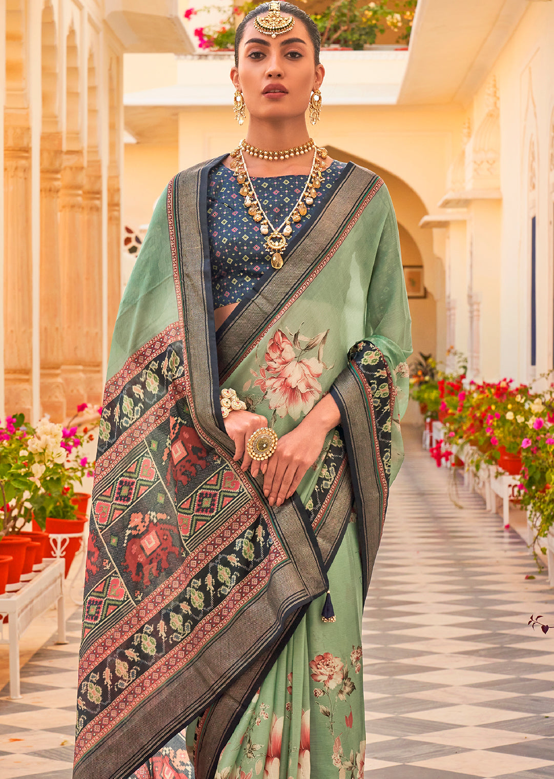 Pistachio Green Woven Chiffon Patola Saree