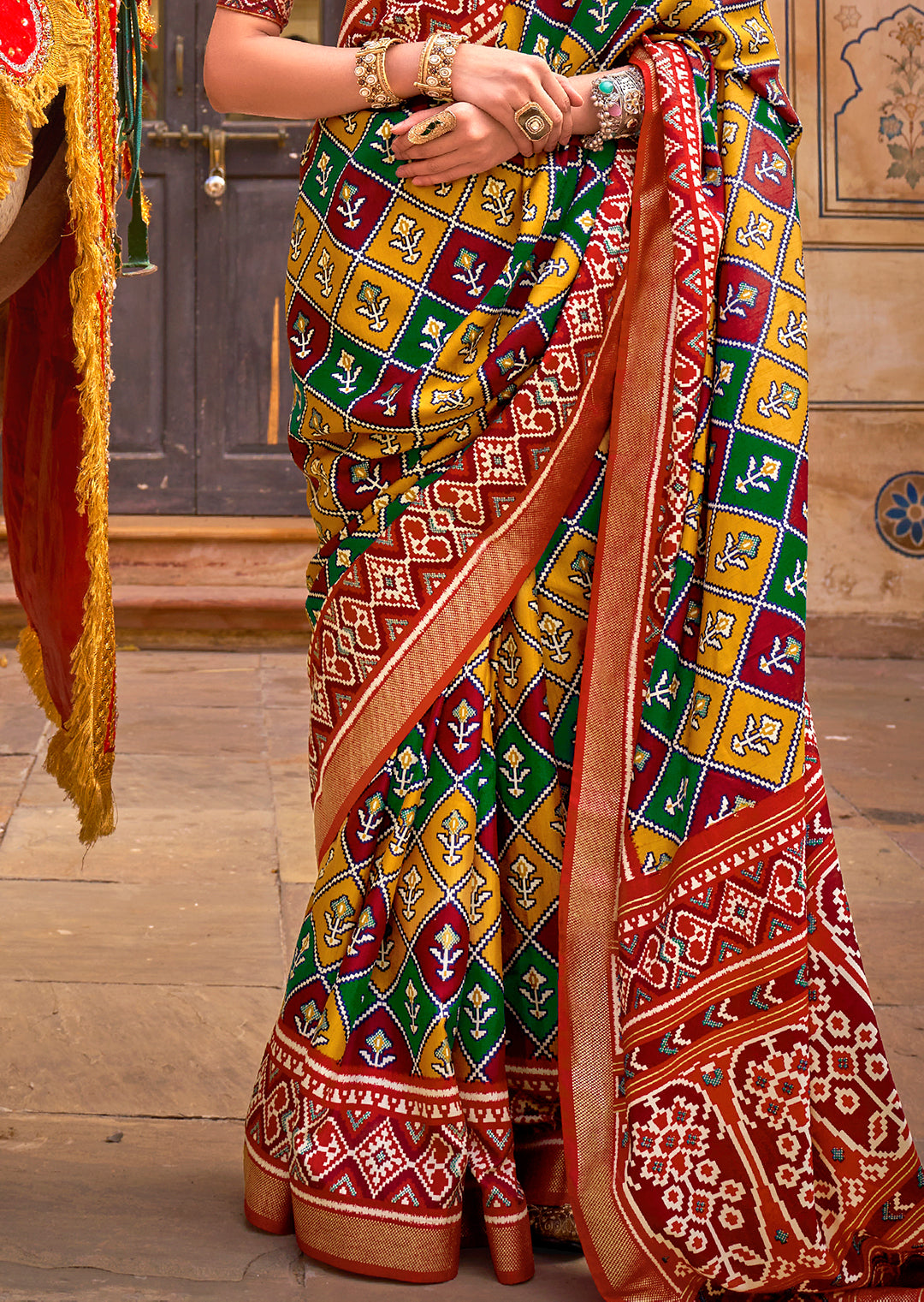 Mustard Yellow & Red Woven Patola Silk Saree