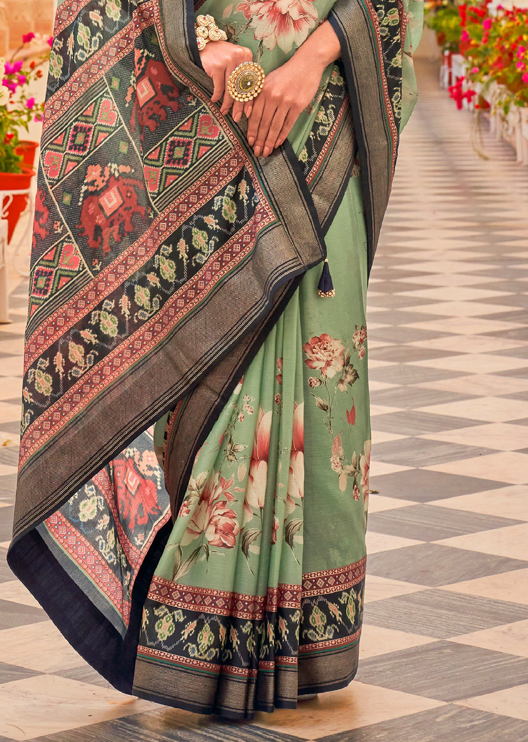 Pistachio Green Woven Chiffon Patola Saree