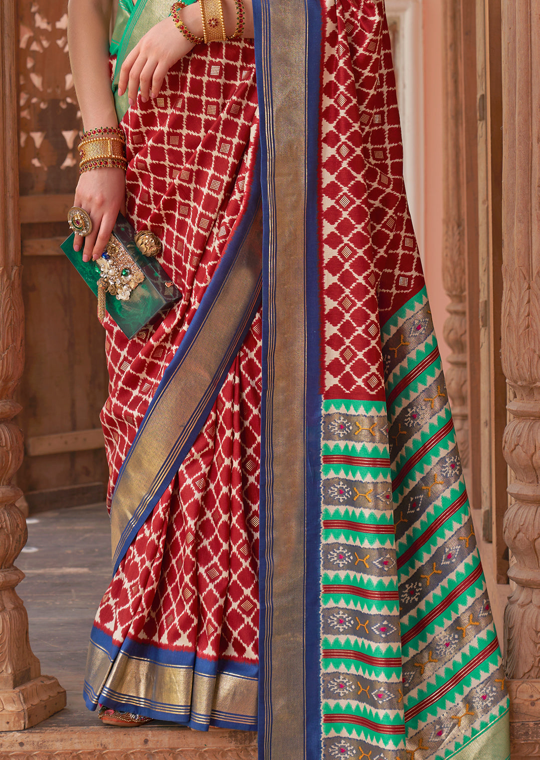 Red	Woven Patola Silk Saree