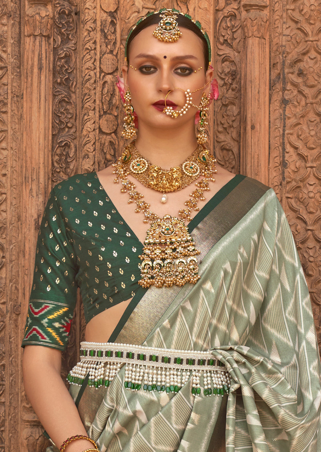 Tea Green Woven Patola Silk Saree