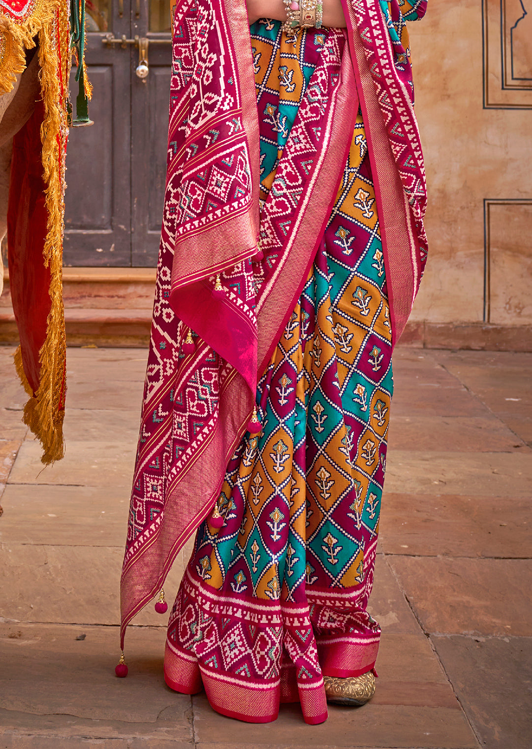 Pink	Woven Patola Silk Saree