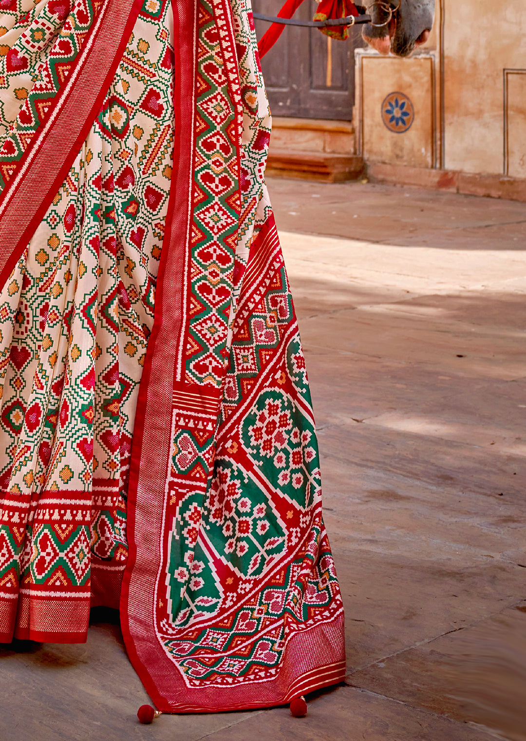 Pearl White & Red	Woven Patola Silk Saree