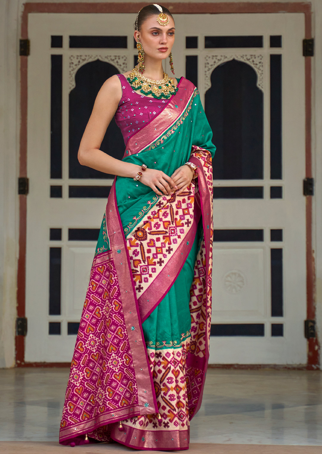 Turquoise Green Woven Traditional Patola Silk Saree