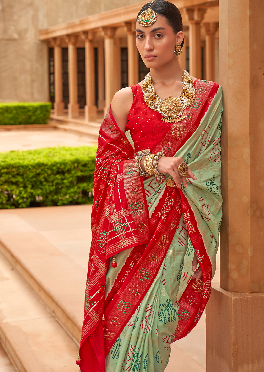 Tea Green Woven Traditional Bandhani Patola Silk Saree