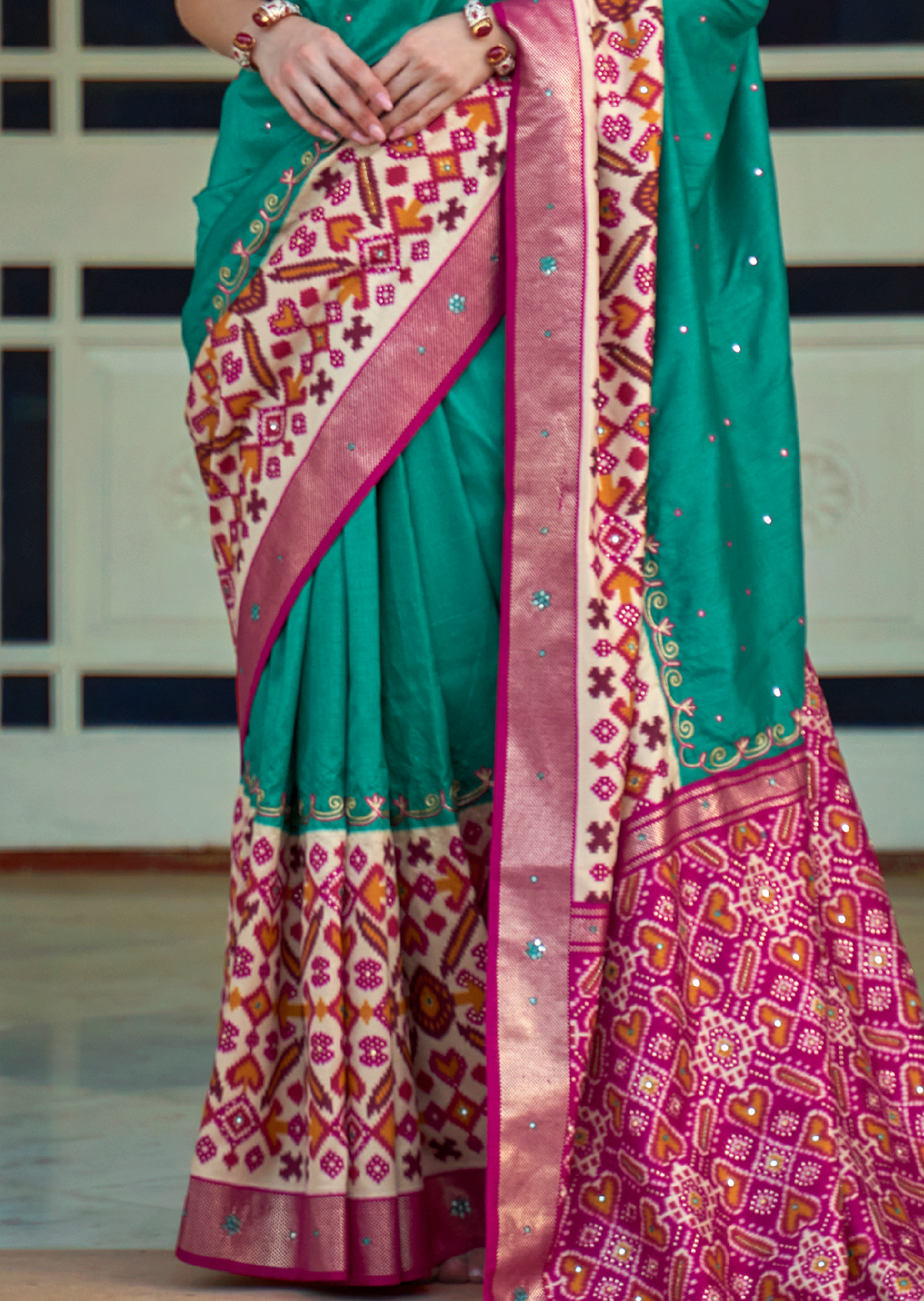 Turquoise Green Woven Traditional Patola Silk Saree