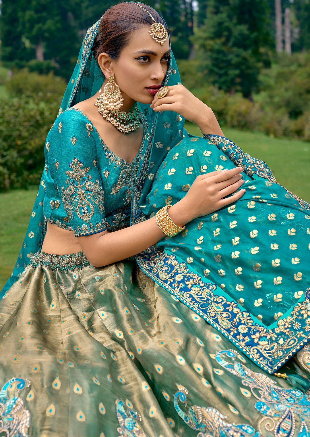 Teal Blue Heavy Embroidered Premium Designer Silk Lehenga