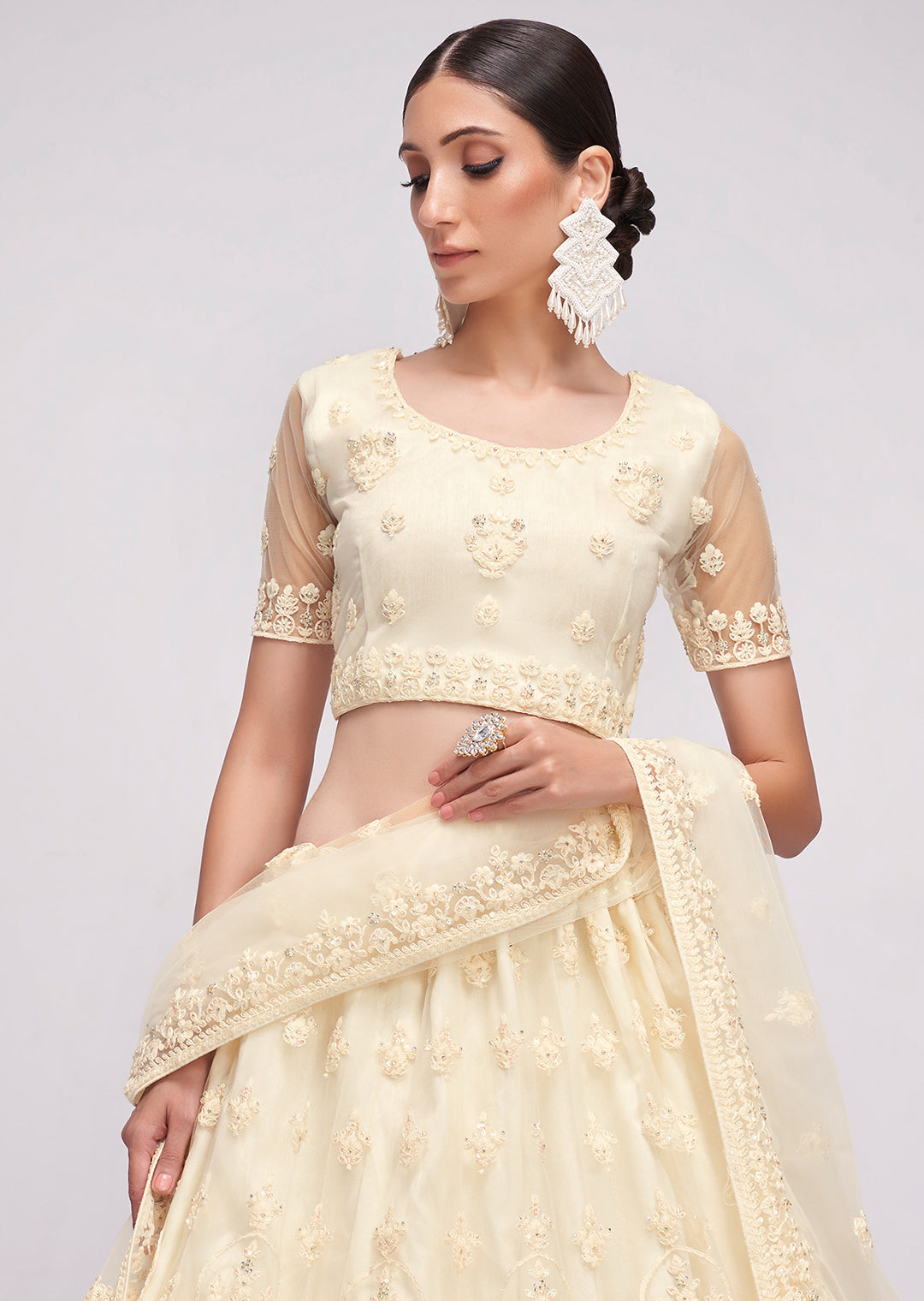 PEARL WHITE HEAVY EMBROIDERED PREMIUM NET DESIGNER LEHENGA