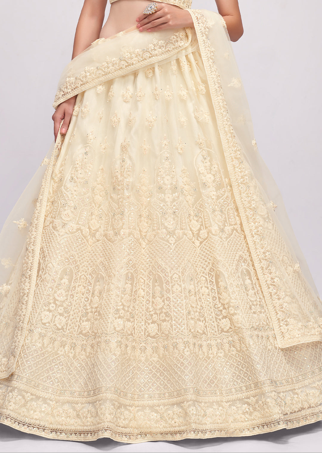 PEARL WHITE HEAVY EMBROIDERED PREMIUM NET DESIGNER LEHENGA