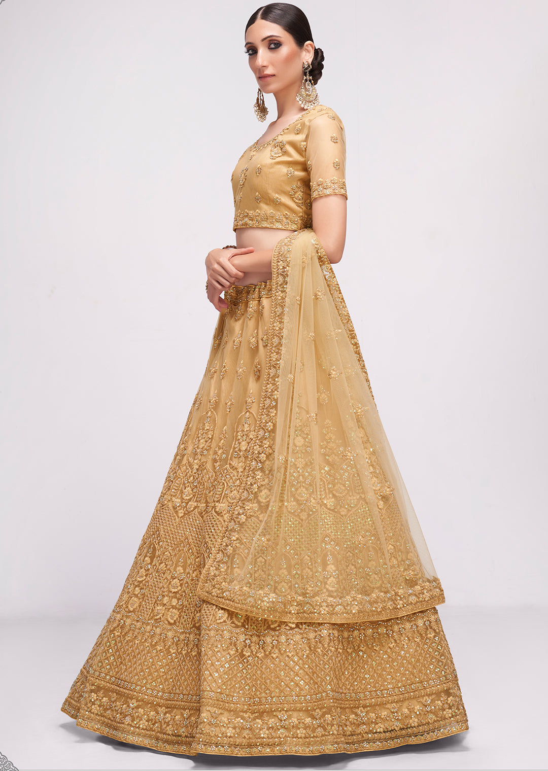 BEIGE HEAVY EMBROIDERED PREMIUM NET DESIGNER LEHENGA