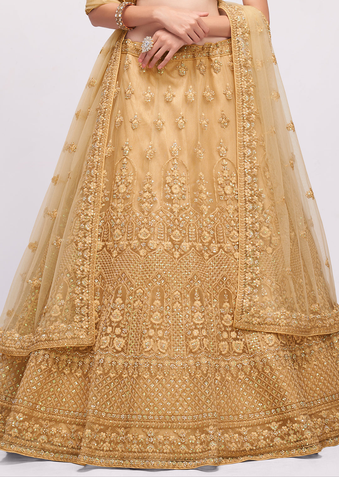 BEIGE HEAVY EMBROIDERED PREMIUM NET DESIGNER LEHENGA