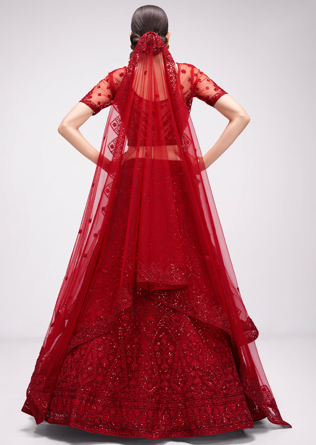 RED HEAVY EMBROIDERED PREMIUM NET DESIGNER LEHENGA