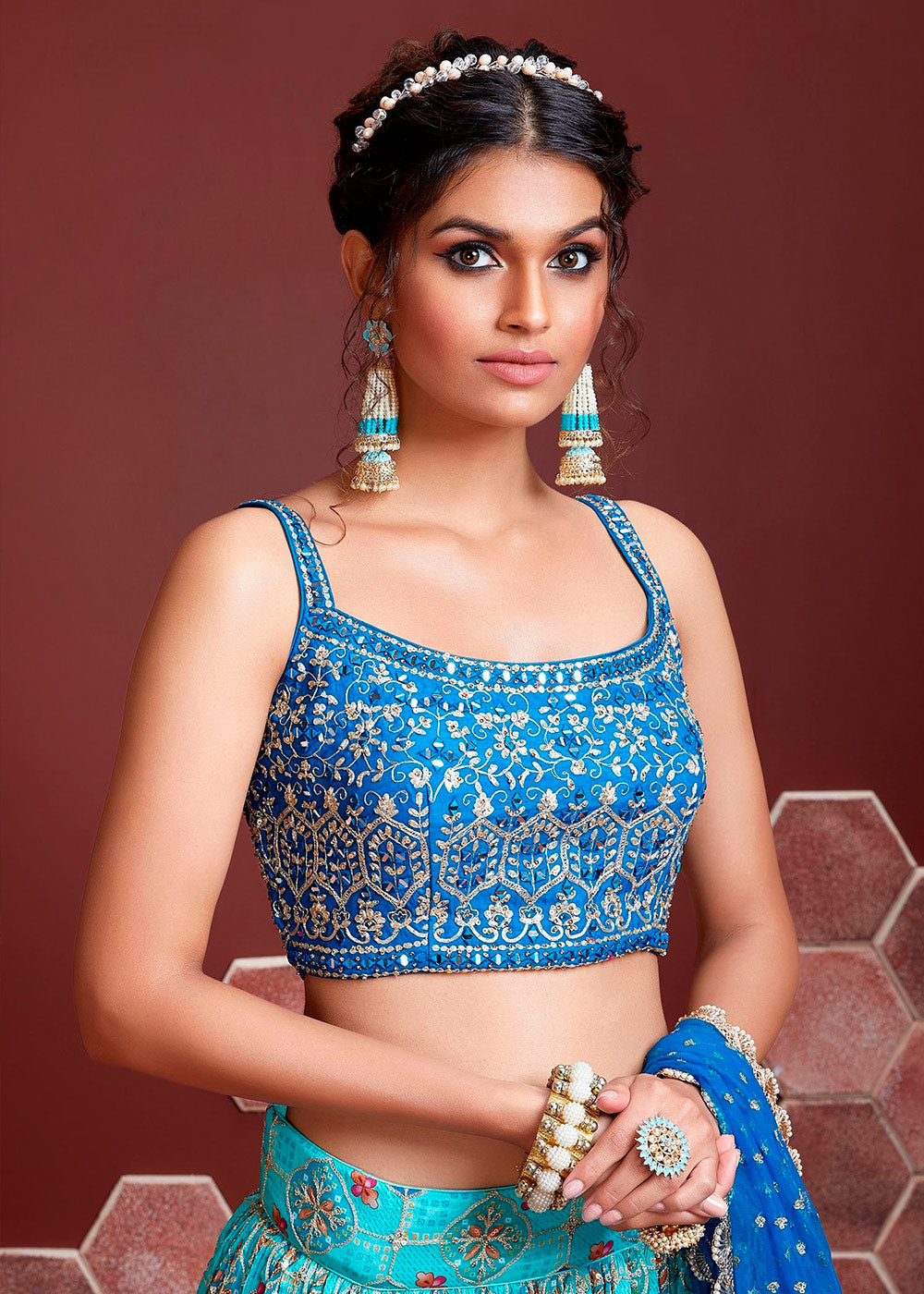 DEEP SKY-BLUE SILK LEHENGA WITH HEAVY EMBROIDERED BLOUSE