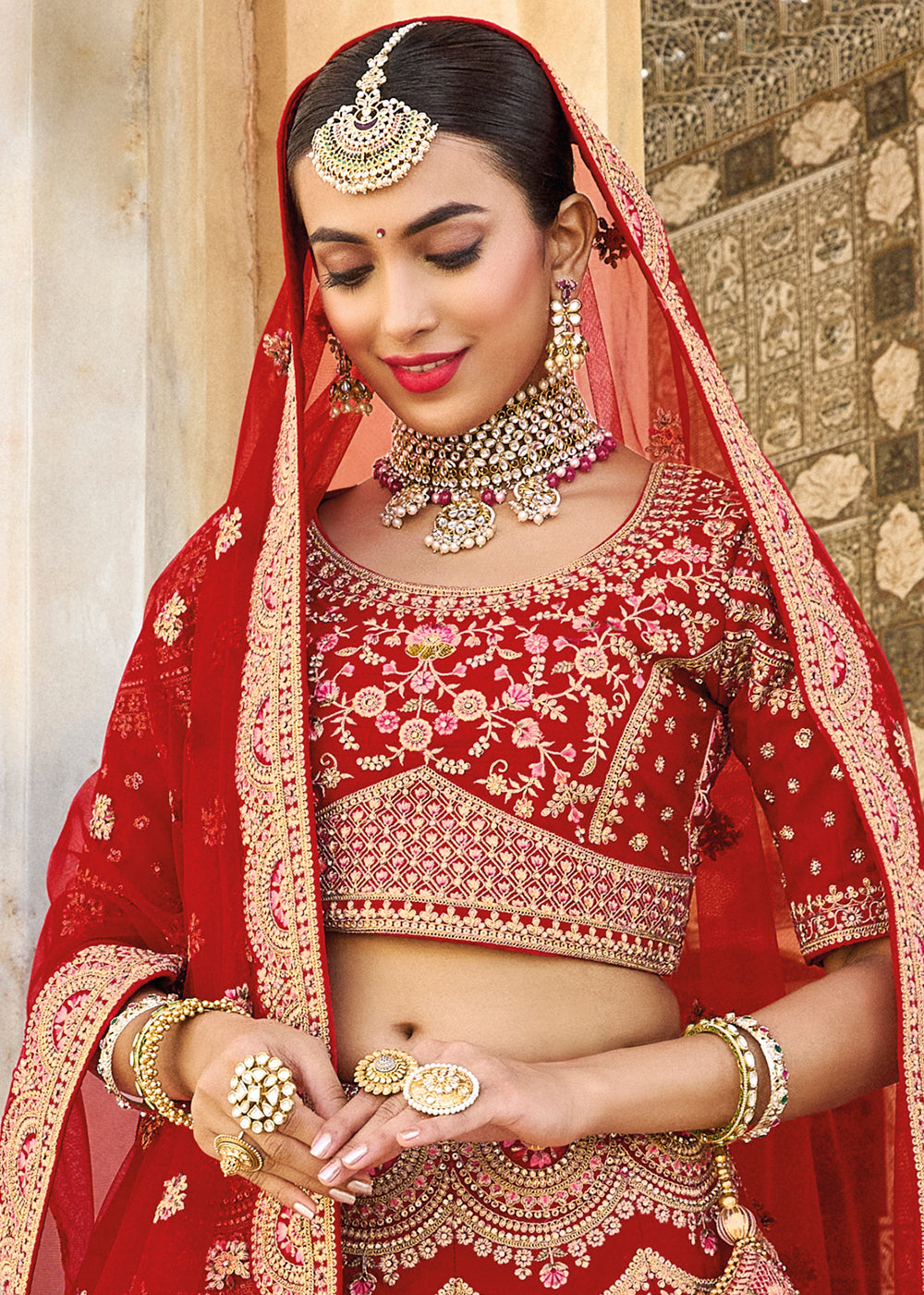 RED HEAVY EMBROIDERED DESIGNER BRIDAL LEHENGA