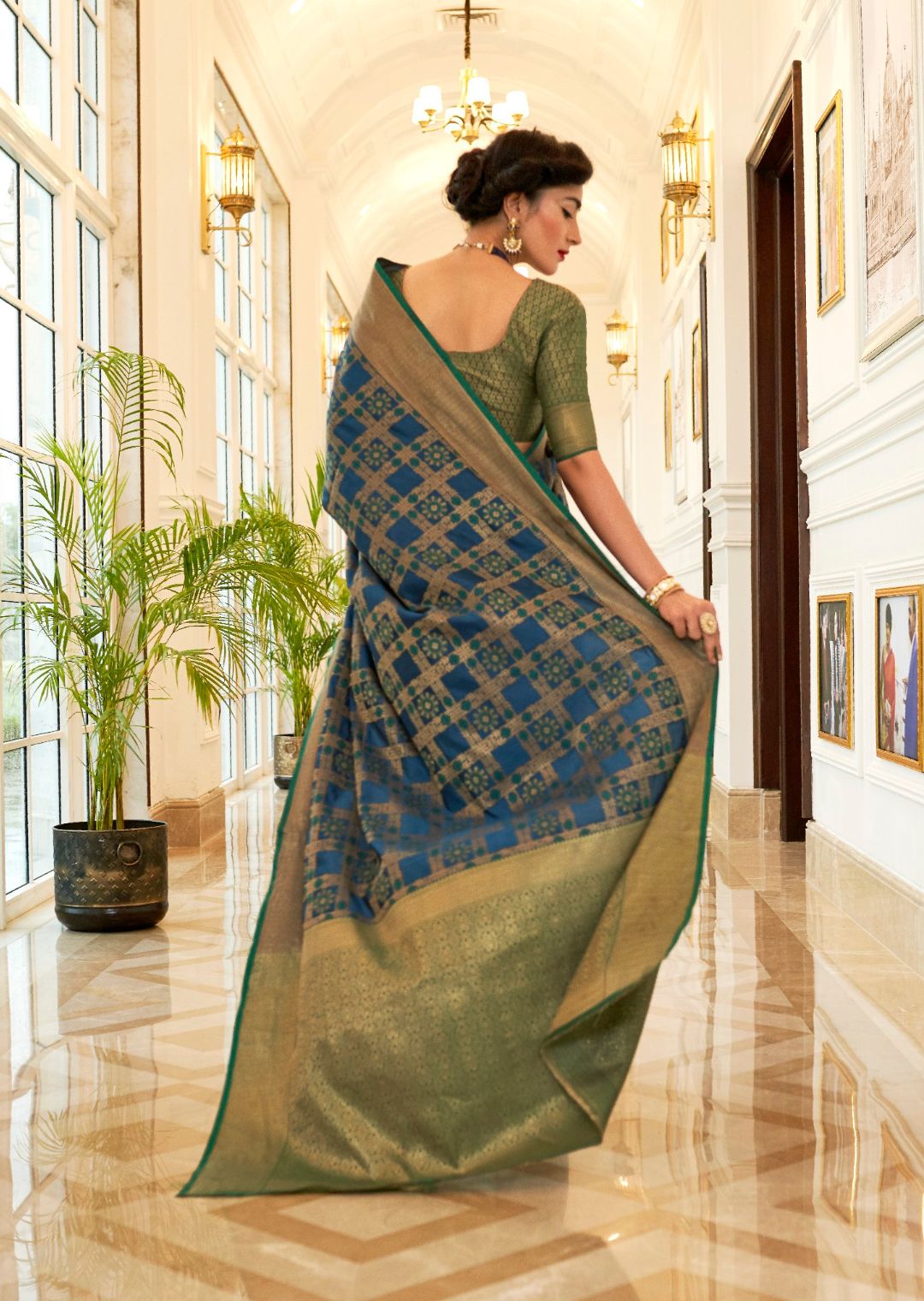 Turquoise Green Woven Traditional Patola Silk Saree