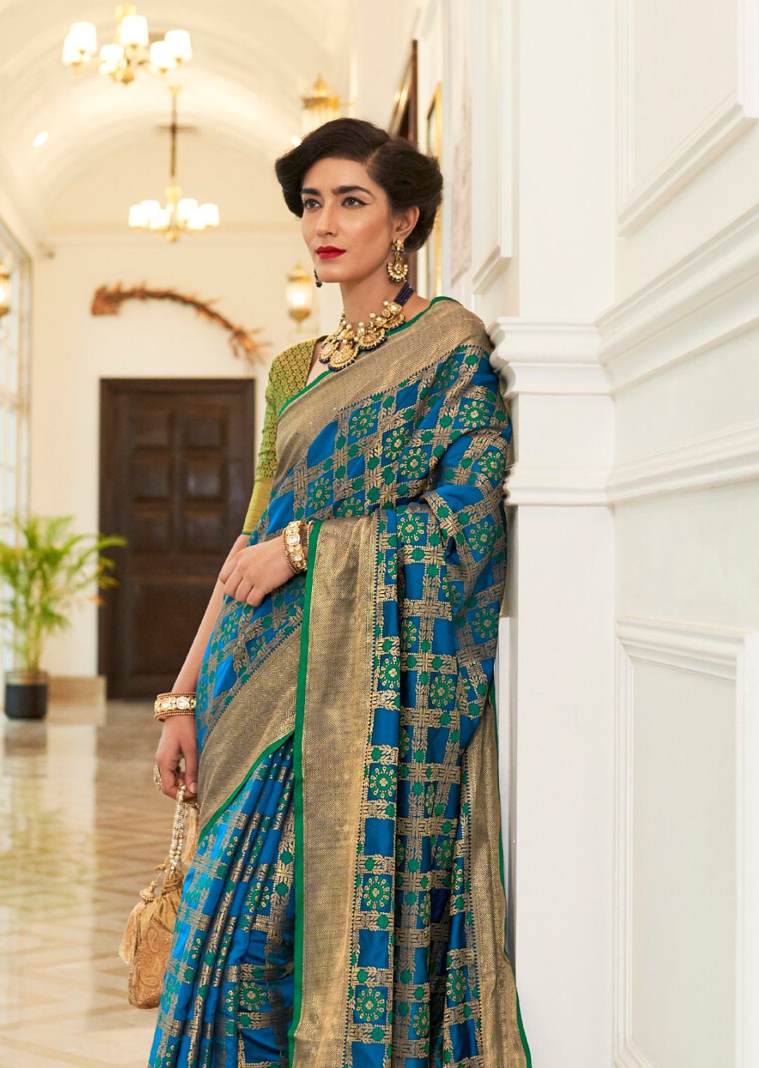 Turquoise Green Woven Traditional Patola Silk Saree