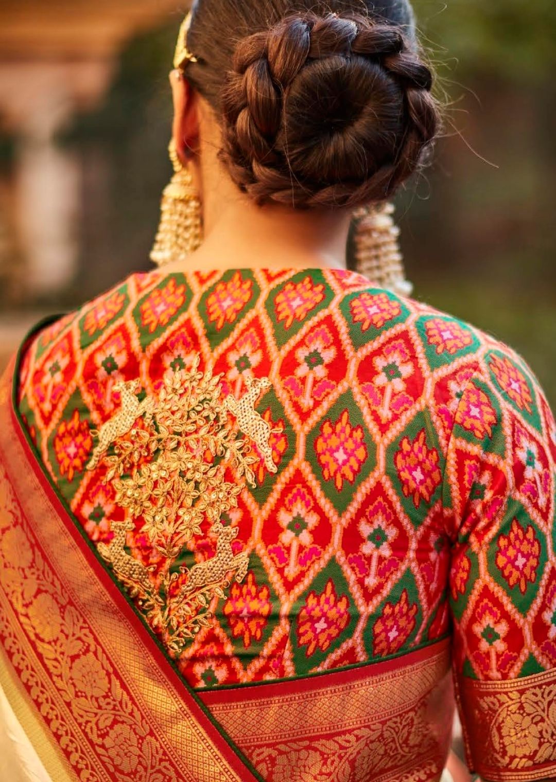 Pearl White Woven Traditional Patola Silk Saree With Embroidered Silk Blouse