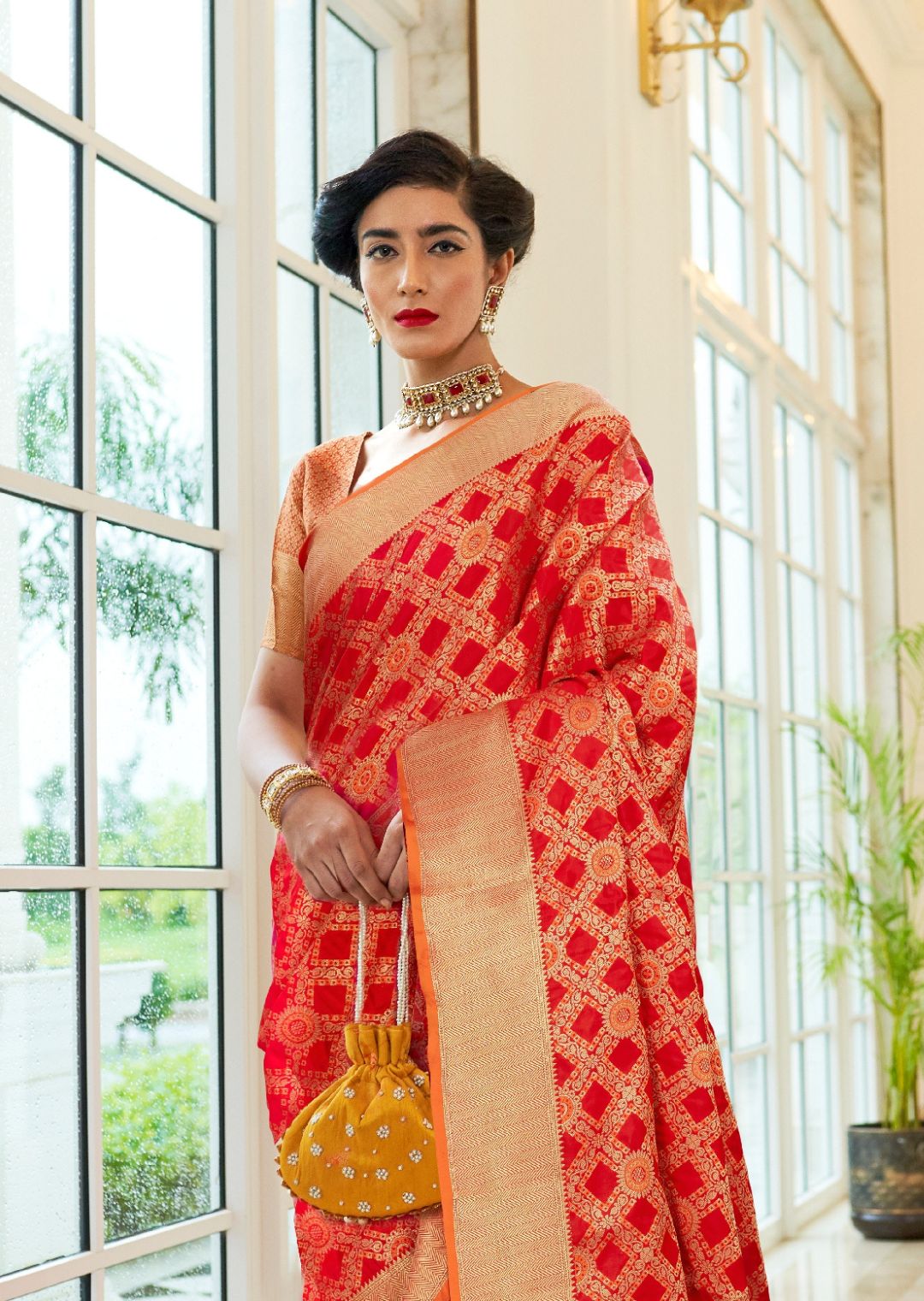 Coral red Woven Traditional Patola Silk Saree