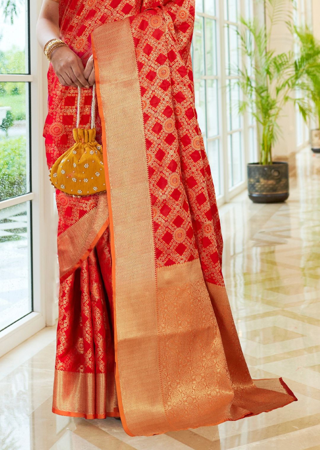 Coral red Woven Traditional Patola Silk Saree