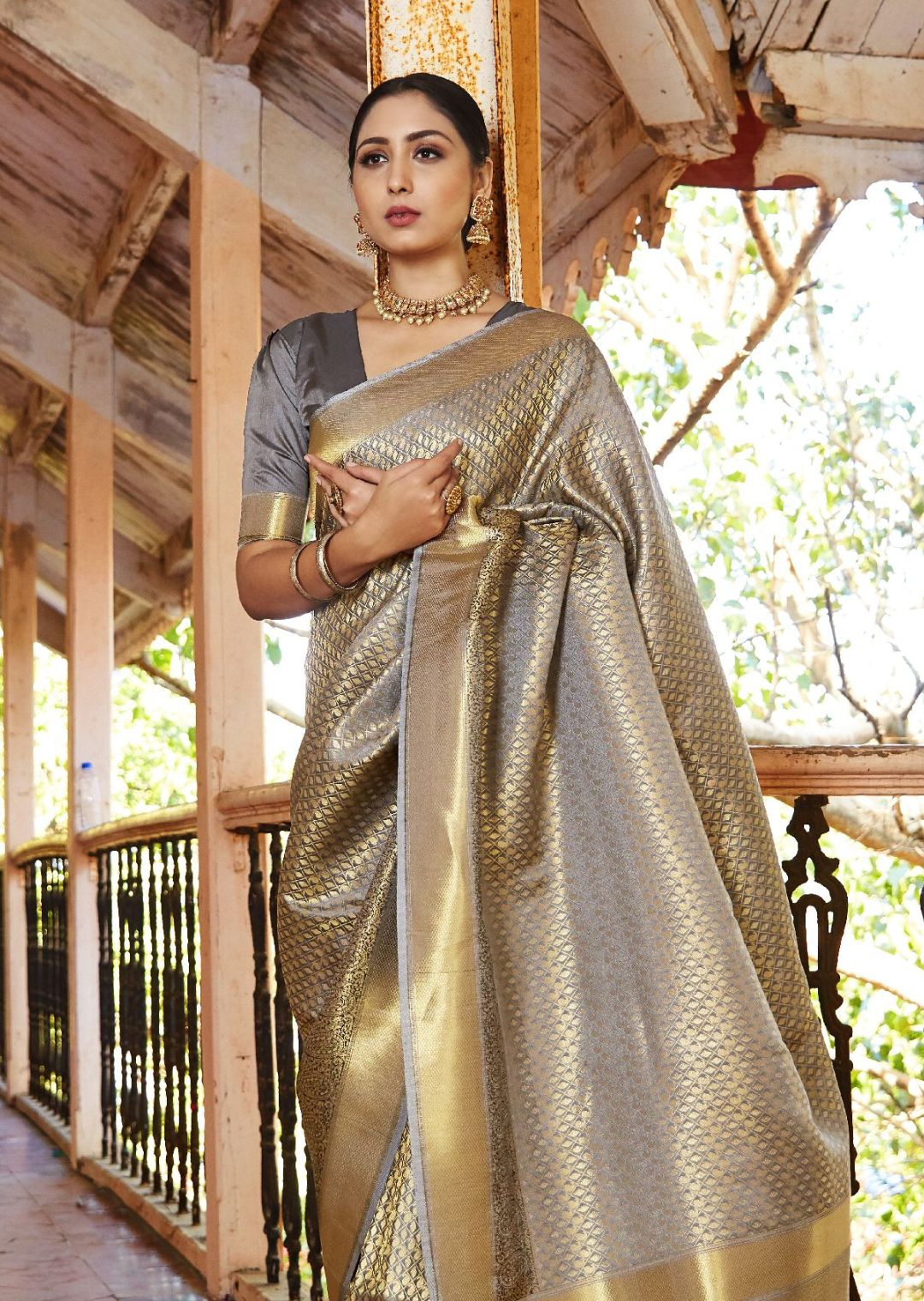 Gold meenakari jacquard silksaree,contrast border of thilakam mokku,neli  kodi poun,kathir,pallu of meenakari manga,jaal