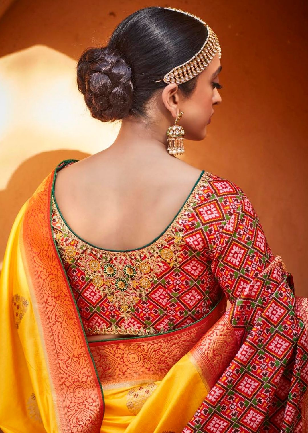 Mustard Yellow Woven Traditional Patola Silk Saree With Embroidered Silk Blouse