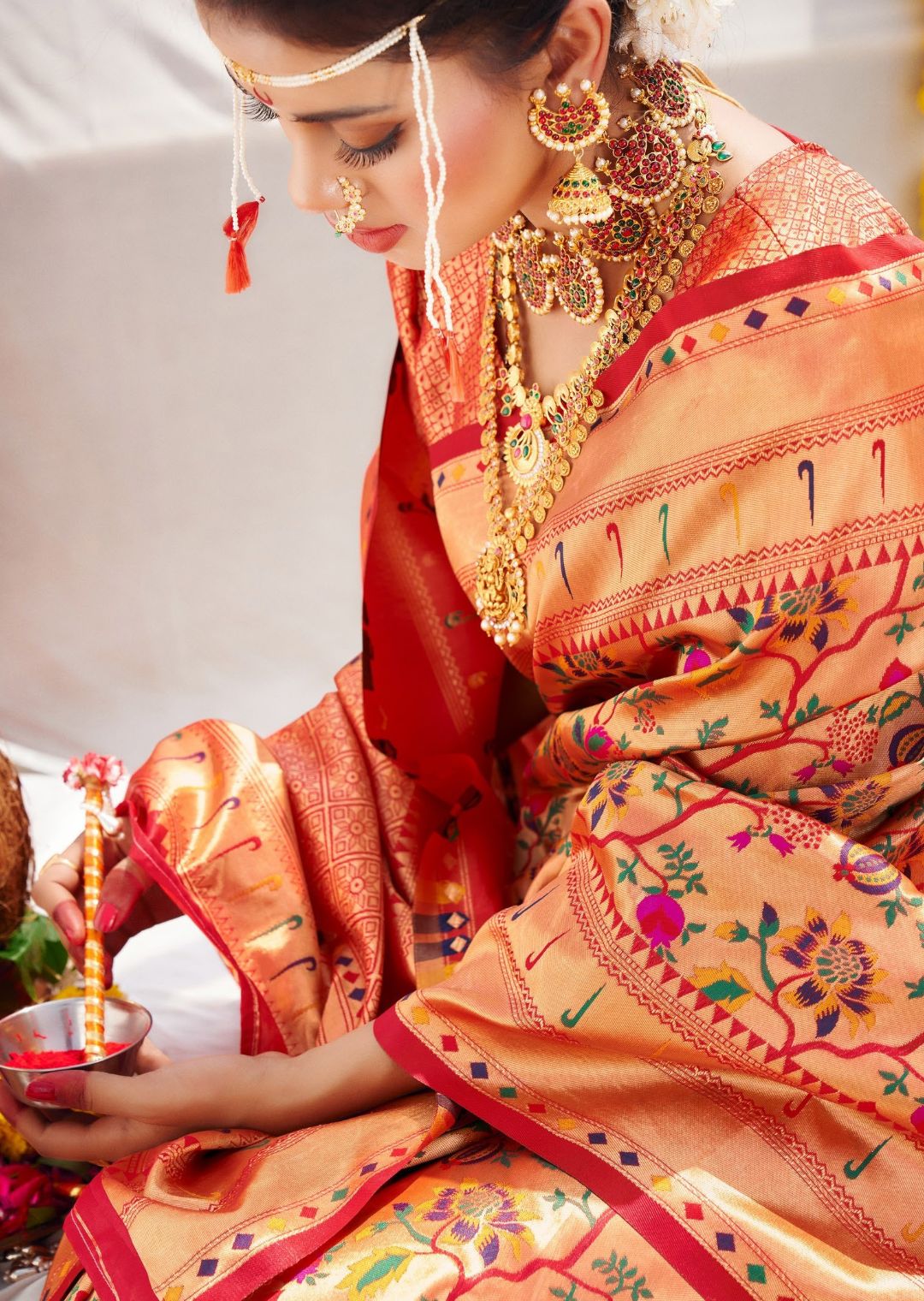 10 Gorgeous Bengali Bridal Looks with Stunning Red Nail Art