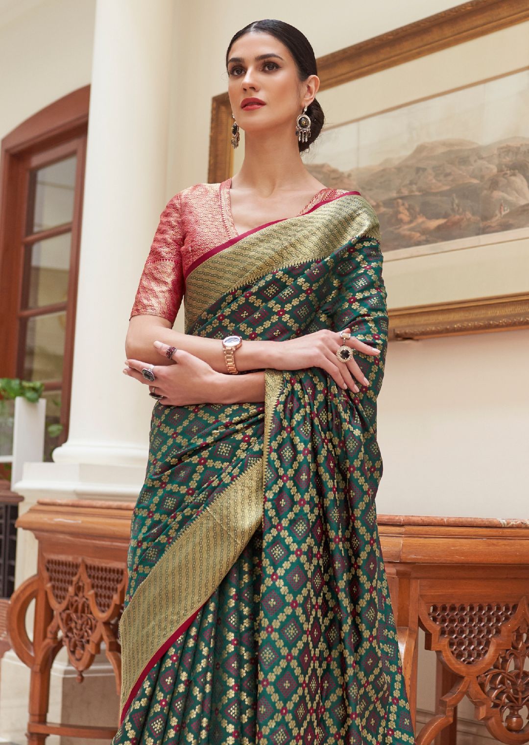 Bottle Green Zari Woven Traditional Patola Silk Saree With Self Brocade Blouse