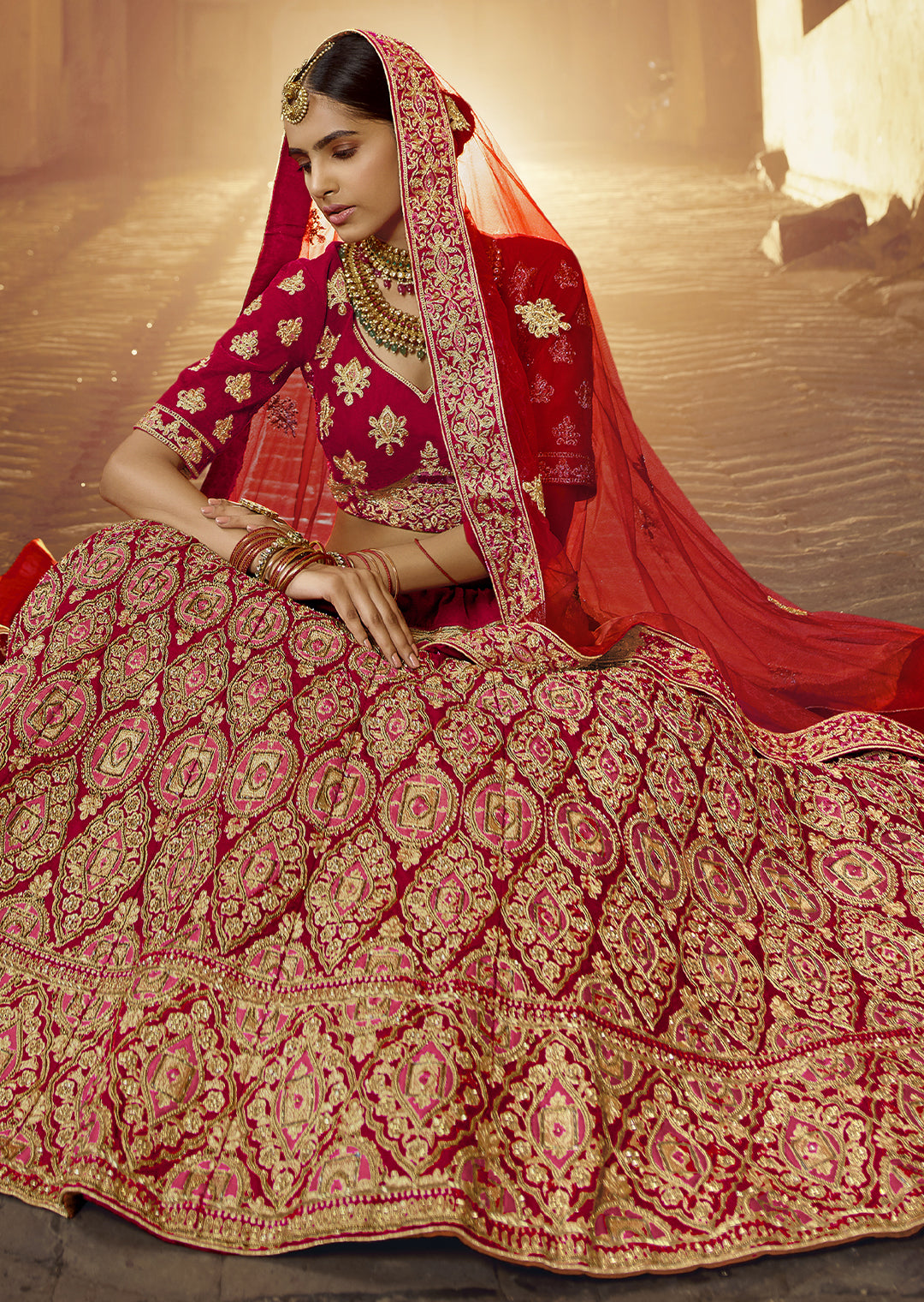 RED HEAVY ZARI EMBROIDERED PREMIUM VELVET DESIGNER BRIDAL LEHENGA