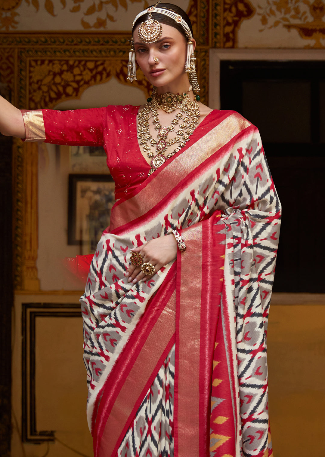 WHITE AND RED WOVEN PATOLA SILK SAREE