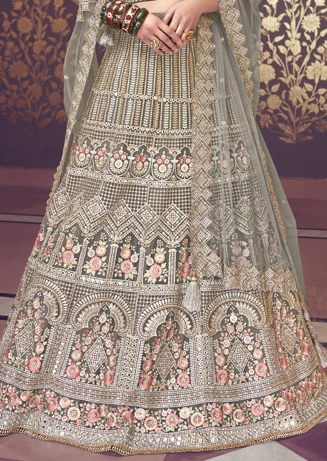 SAGE GREEN HEAVY EMBROIDERED PREMIUM NET DESIGNER LEHENGA