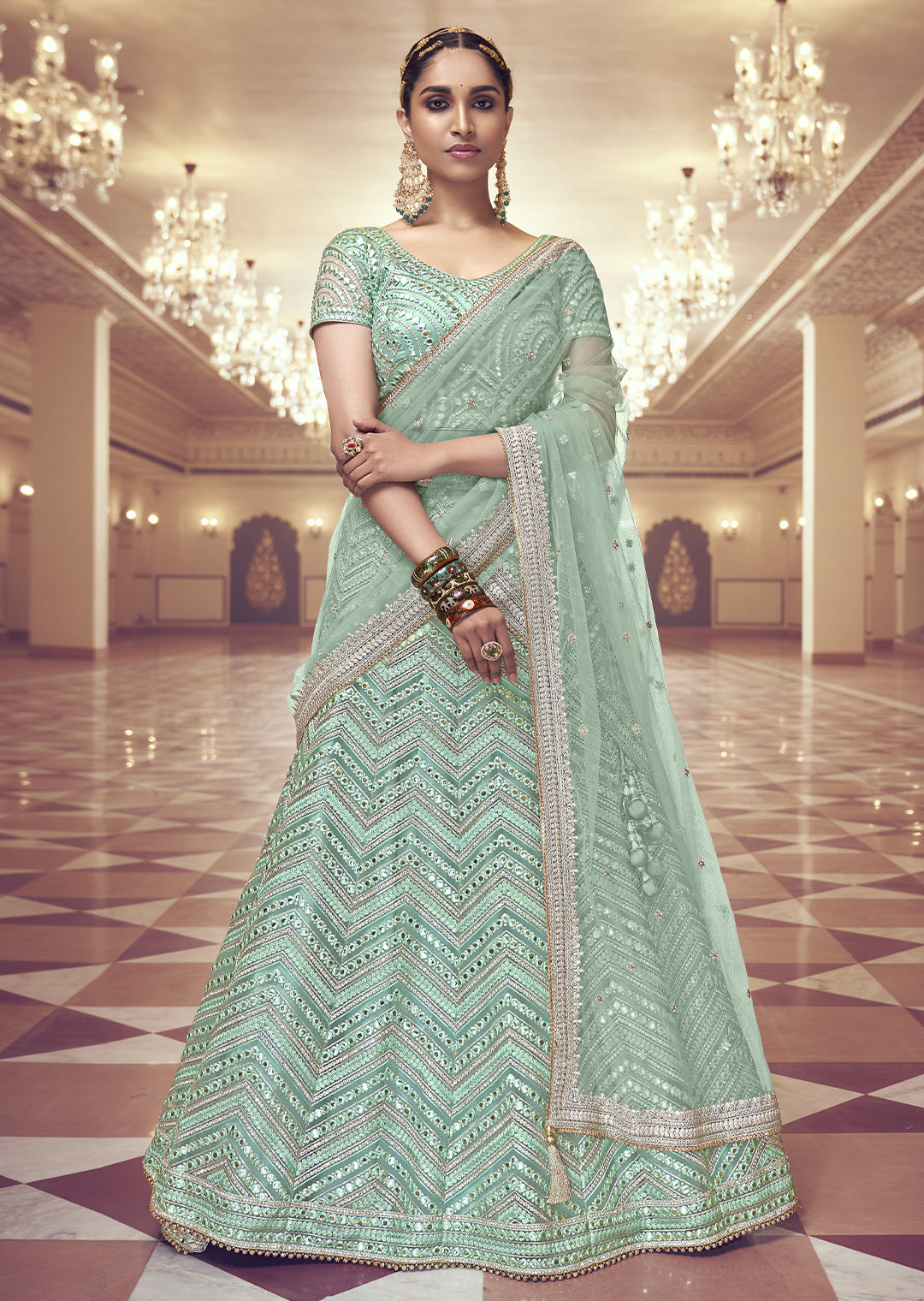 PALED TURQUOISE GREEN HEAVY EMBROIDERED PREMIUM NET DESIGNER LEHENGA