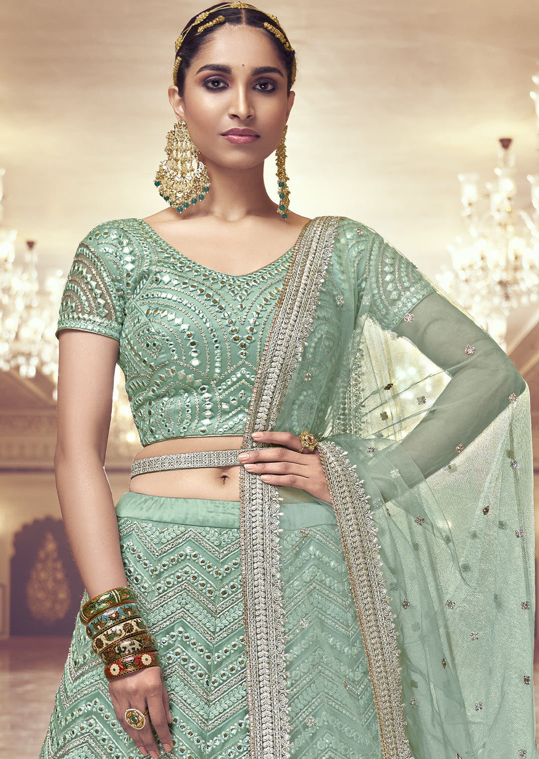 PALED TURQUOISE GREEN HEAVY EMBROIDERED PREMIUM NET DESIGNER LEHENGA