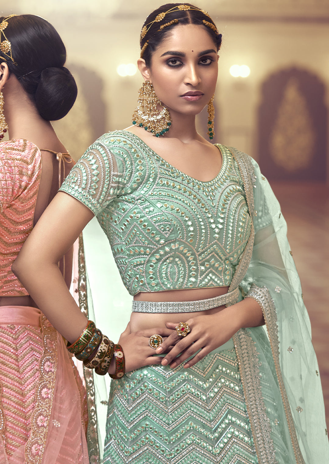 PALED TURQUOISE GREEN HEAVY EMBROIDERED PREMIUM NET DESIGNER LEHENGA