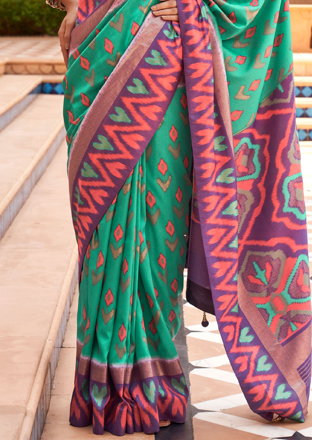 TURQUOISE GREEN WOVEN PATOLA SILK SAREE