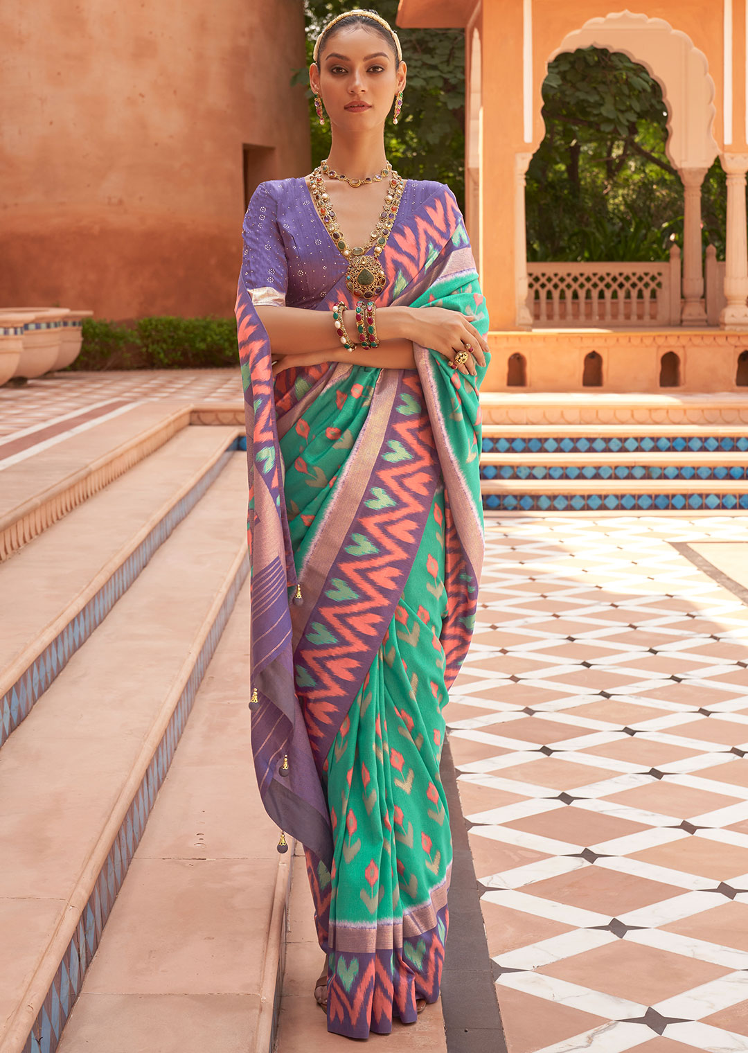 TURQUOISE GREEN WOVEN PATOLA SILK SAREE