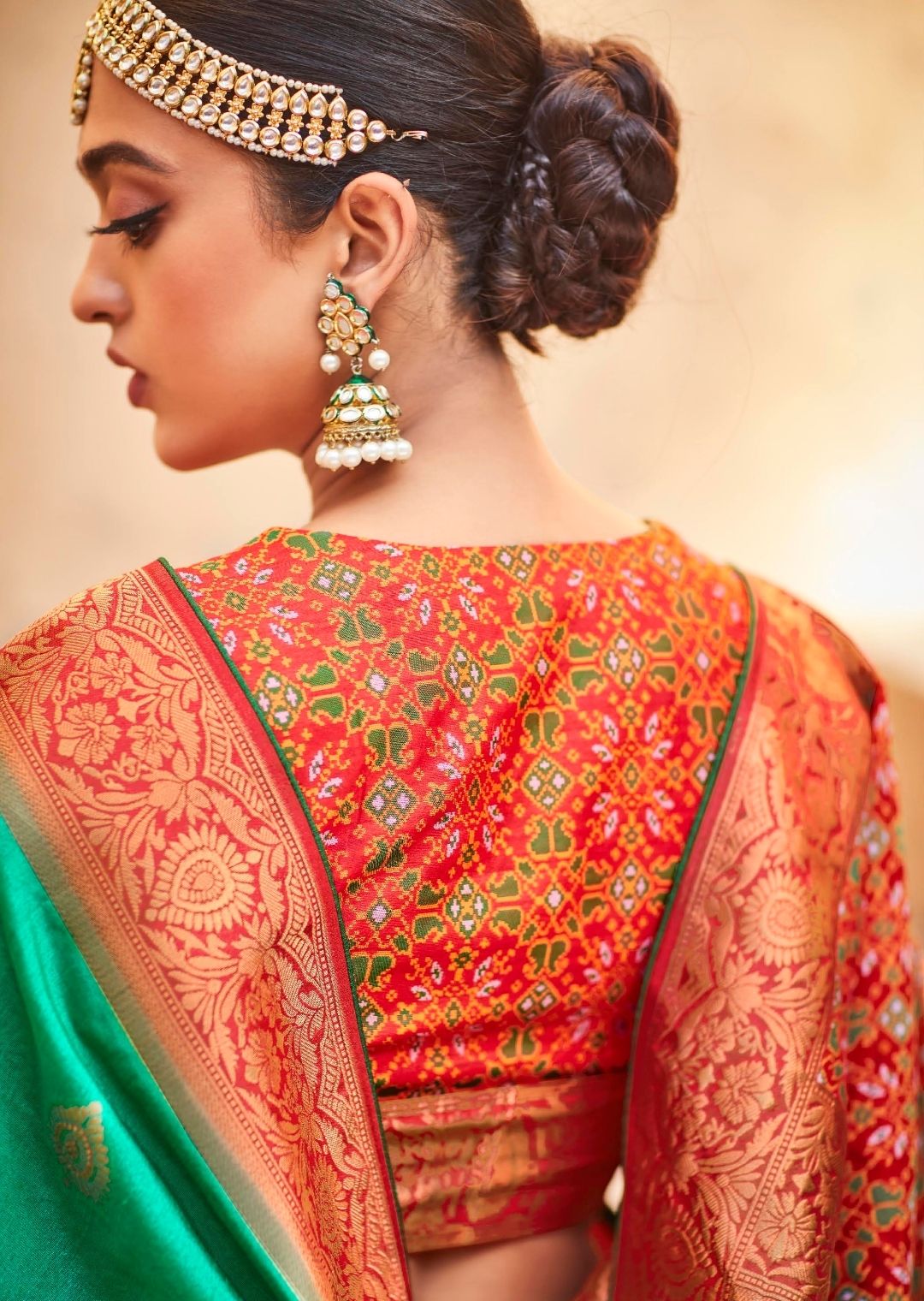 Shamrock Green Woven Traditional Patola Silk Saree With Embroidered Silk Blouse