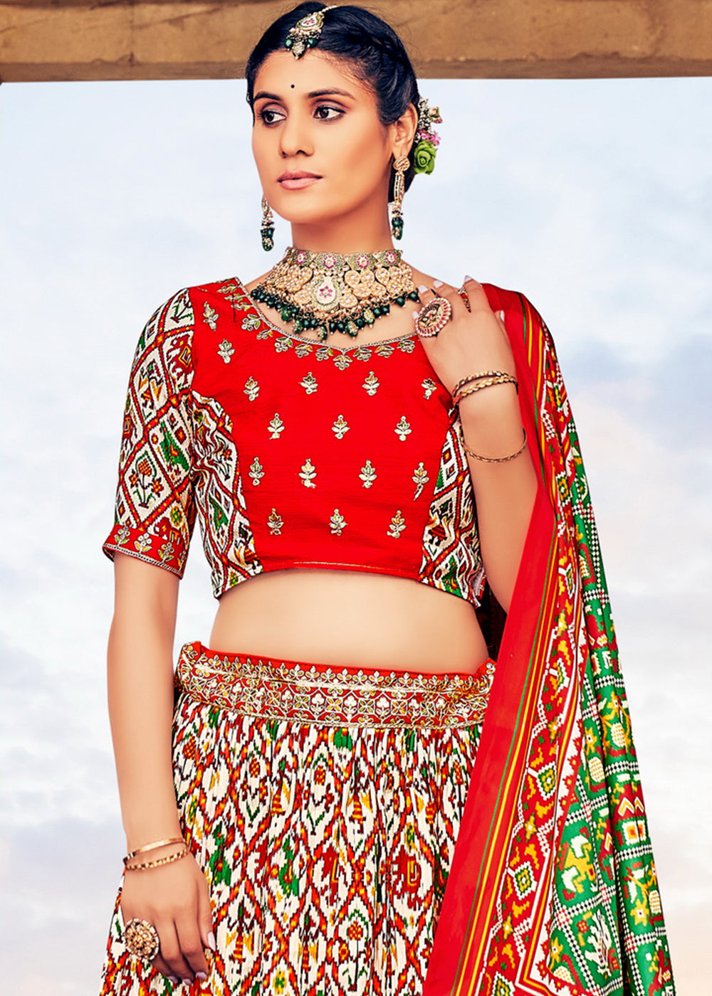 WHITE & RED	HAND CRAFTED PATOLA SILK LEHENGA WITH EMBROIDERED SILK BLOUSE