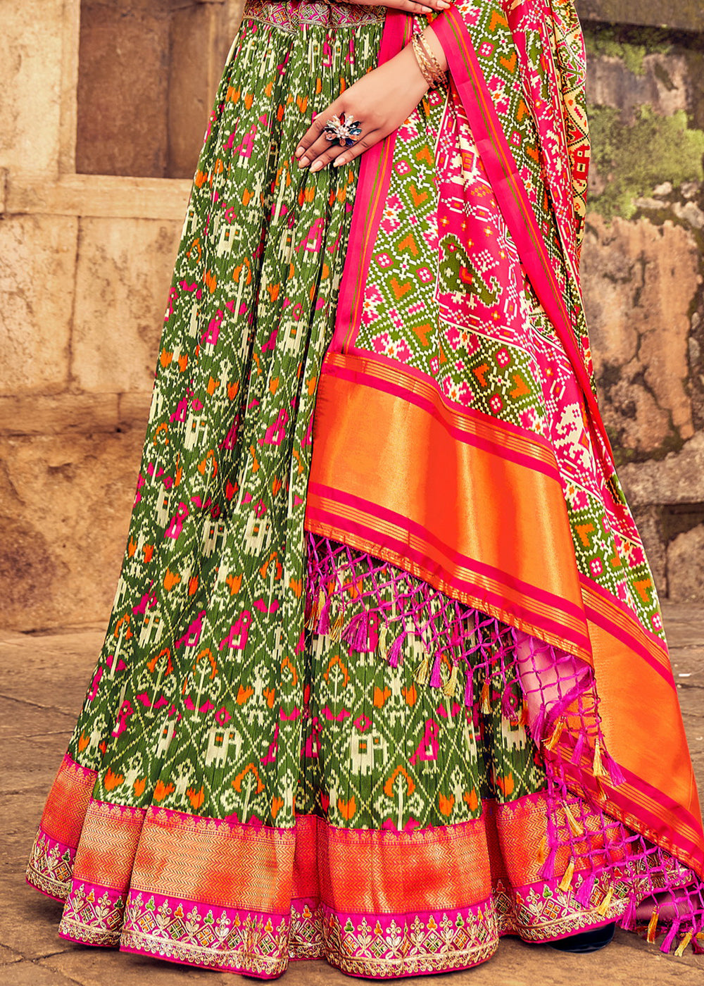 OLIVE GREEN HAND CRAFTED PATOLA SILK LEHENGA WITH EMBROIDERED SILK BLOUSE