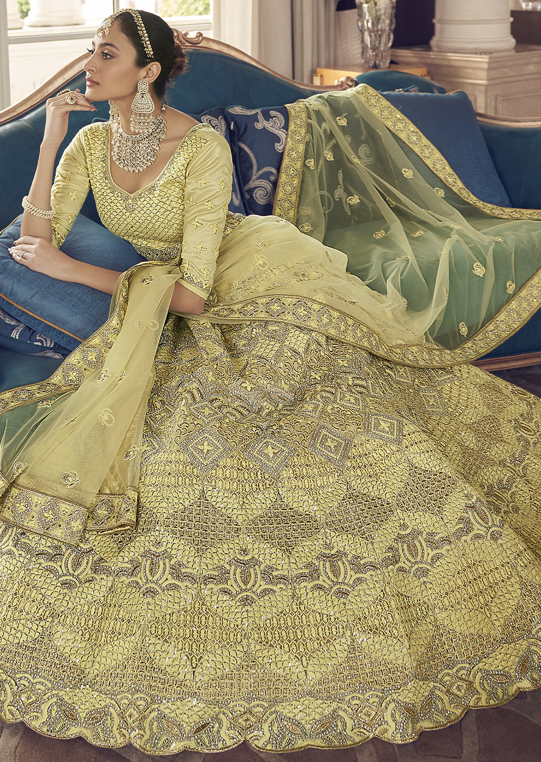 PARCHMENT YELLOW HEAVY EMBROIDERED DESIGNER LEHENGA