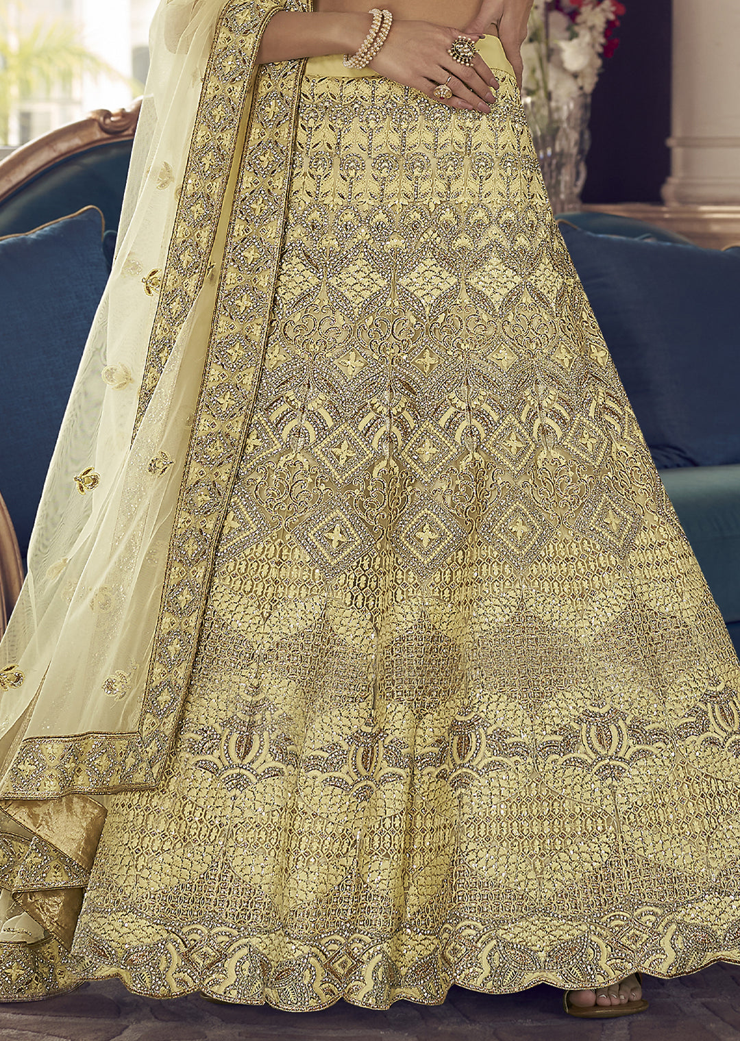 PARCHMENT YELLOW HEAVY EMBROIDERED DESIGNER LEHENGA