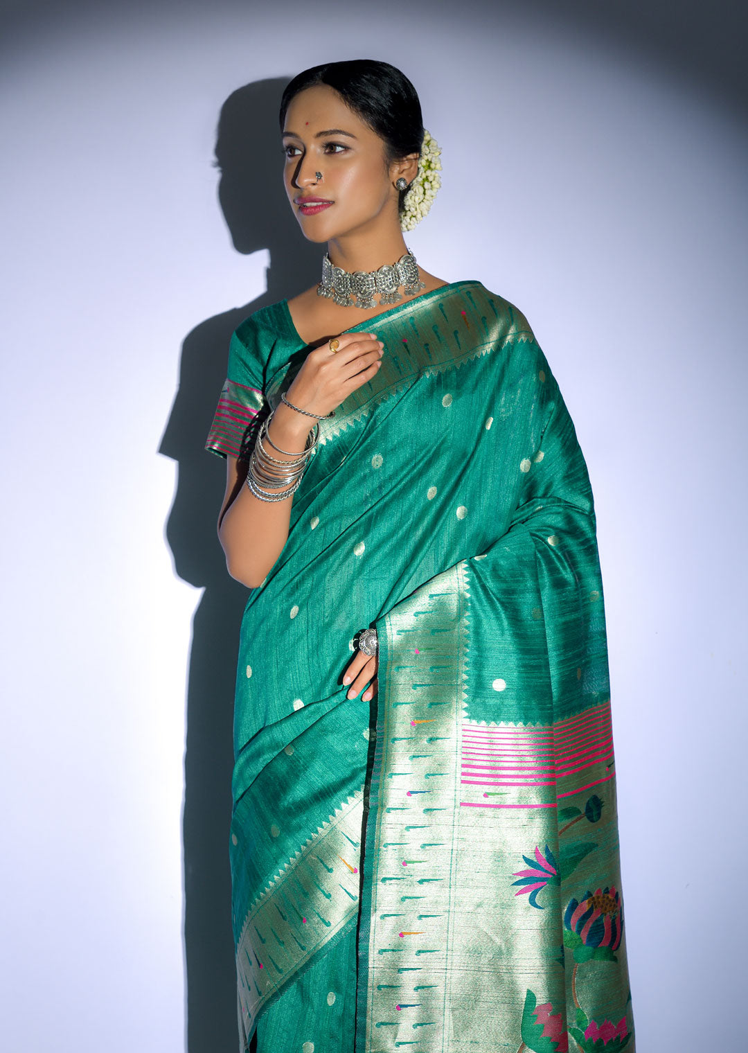 PEACOCK GREEN ZARI WOVEN TRADITIONAL PAITHANI SILK SAREE